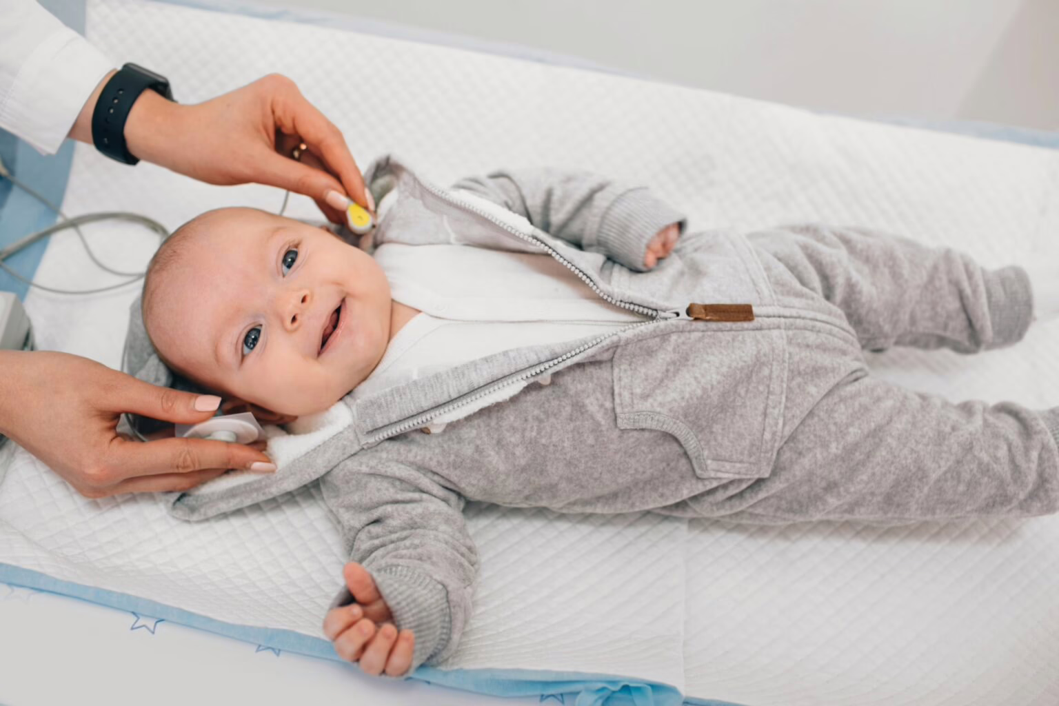 Pediatric Hearing Screening Newborn baby receiving a hearing test