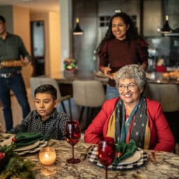 Family sitting down for a holiday dinner