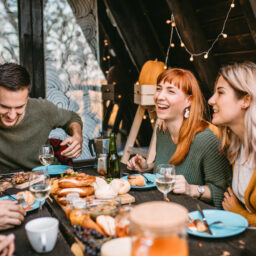Group of friends having dinner together